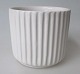 Fluted vase, 
Michael 
Andersen, 
Bornholm, 
Denmark, app. 
1950. White 
glazed. H .: 
7.5 cm. Dia .: 
...
