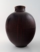 Royal 
Copenhagen 
Kresten Bloch 
unique oxblood 
glaze stoneware 
vase.
Stamped in 
monogram. ...