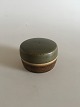 Bing & Grondahl 
Lidded 
Stoneware Box 
No 5810. 5 cm H 
(1 31/32"). 8 
cm dia (3 
5/32"). In good 
...