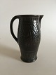 Bing & Grondahl 
Cathinka Olsen 
Pitcher with 
Handle No 154 
19 cm H (7 
31/64") In good 
condition,