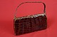 Bag in 
crocodile skin, 
h: 18 cm, w: 29 
cm