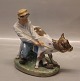 Royal 
Copenhagen 0772 
RC Boy with 
Calf Chr. T.  
1906 6.5" Over 
glaze 
decoration In 
mint and nice 
...