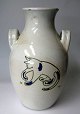 Vase of 
pottery, 
Denmark, 1930, 
decorated with 
a cat playing 
with a spider. 
The motif is 
...