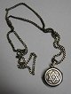 Silver chain 
with photo 
holder. About 
1900. 
Holder with 
decoration in 
the form of the 
Star of ...