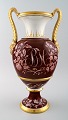 Large antique 
B&G Bing & 
Grondahl vase 
in purple with 
handles in gold 
with faun-face.
Early ...