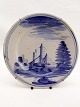 1800 Century 
earthenware 
plate with 
architecture 
dia. 22 cm. No. 
290459