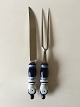 Rosenthal Blue 
Bjorn Wiinblad 
Siena Meat 
Cutting Set in 
Ceramic and 
Stainless 
Steel. 33 cm L 
(12 ...