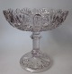 English pressed 
glass 
centerpiece, 
19th century. 
Stamped. 
Height: 21 cm. 
Dia .: 22 ...