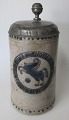 German beer mug 
in gray salt 
glaze with 
pewter lid, 
18th century. 
Cylinder Form. 
With handle. In 
...