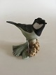 Heubach Figurine of Green Bird on a Pine Cone