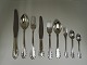 Georg Jensen. 
Silver 
(830).Rose. 12 
persons 
cutlery. 
Consisting of
12 dinner 
knives
12 dinner ...