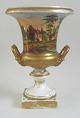 Vase of 
porcelain, 
Germany, 
Empire, about 
1820. Square 
foot, profiled 
stem, urn-
shaped with two 
...