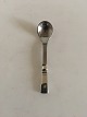 Georg Jensen 
Sterling Silver 
and Steel 
Mustard Spoon 
No 106. 8.5 cm 
L (3 11/32"). 
From 1932-1945