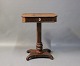 Small antique 
sewing/Work 
table in 
rosewood with 
turning 
function and 
delicate 
details. The 
...
