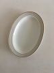 Bing & Grondahl 
Tiber Oval Tray 
No 18. 24 cm (9 
29/64"). White 
with Light Grey 
Border and Gold 
Edge.