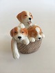 Royal 
Copenhagen 
"Puppy 
Collection" 
Figurine of 
Mongrels in 
Basket No 745. 
Created by 
Allan ...