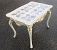 New Rococo 
tiled table in 
white painted 
pine with 
gilding, 
Denmark, 19/20. 
century. Table 
with ...
