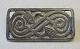 Brooch in 
sterling 
silver, Viking 
copy, 20th 
century. 
Denmark. 3.6 x 
1.8 cm. 
Stamped: 925. 
G. Ph.