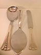 spoon, cake 
server and 
knife.
Three tower 
silver from the 
year 1950
silver most: 
His Fr. C. ...