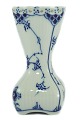 Royal 
Copenhagen 
porcelain. 
Royal 
Copenhagen, 
blue fluted 
full lace; A 
porcelain vase 
#1162. ...