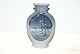 Royal 
Copenhagen 
Christmas Vase 
1923
factory 1st 
quality
Height 18 cm.
Perfect 
condition