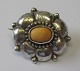 Jugend Silver 
Brooch with 
amber, C.M Cohr 
(1893 - 1937) 
Frederica, 
Denmark. 3 x 
2.5 cm. 
Stamped: ...