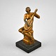 Art Deco, 20. C. sculpture of a naked sitting women playing mandolin. Patinated zinc. Base of ...