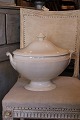 Large fine oval 
old French 
cream colored 
faience terrin, 
with handles on 
the side and 
finely ...