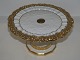 Meissen 
Germany.
Cake stand 
with gold 
decoration from 
around 
1880-1910.
Diameter 22.5 
cm., ...