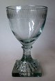 Norwegian 
drinking glass 
"Gorm den 
Gamle" approx. 
1830. With 
grinding on the 
cum. Square 
foot ...