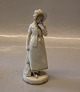 B&G Antique 
Girl with 
bonnet and 
purse 17 cm ca 
1860-1890 Over 
glaze decorated 
with gold Bing 
...