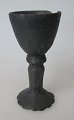 Rare stalk cup, 
black clay, 
baroque shape, 
18th century. 
Denmark. 
Height: 9.6 cm.
Very, very ...