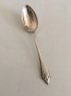 Georg Jensen 
Akkeleje 
Sterling Silver 
Dessert Spoon 
No 021. 
Measures 17 cm 
/ 6 5/8 in.