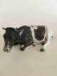 Rosenthal 
Figurine of 
Black and White 
Cow. Measures 
27 cm L (10 
5/8"). 9 cm H 
(3 35/64"). In 
...