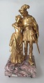 French hat-gilded bronze figure of young lovers, 19th century.Height: 31.5 cm. On square ...
