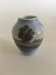 Bing & Grondahl 
Vase No. 
500/5012 with 
Island Lake 
Motif . 9 cm H. 
1st Quality 
from 1970-1983. 
...