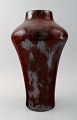 Large and 
impressive 
Kähler, luster 
glaze pottery 
vase, Karl 
Hansen 
Reistrup. 
Formed by 
Herman ...