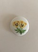 Royal 
Copenhagen 
Porcelain 
Button with 
Handpainted 
Flower Motif. 3 
cm dia.