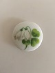 Royal 
Copenhagen 
Porcelain 
Button with 
Handpainted 
Flower Motif. 3 
cm dia. Has a 
chip on the 
back.