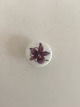 Royal 
Copenhagen 
Porcelain 
Button with 
Handpainted 
Flower Motif. 
1.7 cm dia.