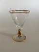 Holmegaard 
"Ida" Liqueur 
Glass with Gold 
on Stem, Rank 
and Foot. 
Measures 10.4 
cm / 4 3/32 in. 
...