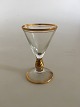 Holmegaard 
"Ida" Schnapps 
Glass with Gold 
on Stem, Rank 
and Foot. 
Measures 8.2 cm 
/ 3 15/64 in. 
...