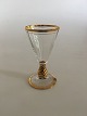 Holmegaard Ida 
Schnapps Glass 
with optical 
stripes and 
gold band
Design: Jacob 
E. ...