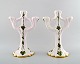 Signe 
Steffensen for 
Kähler: A pair 
of candelabra 
of ceramics, 
decorated with 
glaze in white 
and ...