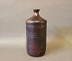 Dark red 
ceramic 
flask/vase in 
great vintage 
condition.
H - 24 cm and 
Dia - 11,5 cm.
