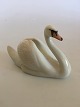 Royal 
Copenhagen Swan 
Figurine No. 
755. 17 cm L. 
Ca. 11 cm H. In 
perfect 
condition. 1st 
Quality.