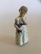 Royal 
Copenhagen 
Figurine No. 
3539 Girl in 
Nightgown with 
Doll. Marked as 
a third. In 
nice whole ...