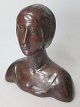 German artist, 
approx. 1910: 
Torso of woman. 
Red clay with 
red copper. 
Height: 21 cm. 
B: 20 ...