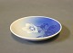 Small round 
plate in 
Christmas Rose 
by Bing & 
Grøndahl, no.: 
30.
Ask for number 
in stock.
10,5 cm.