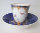 Cup with 
saucer, Derby, 
19th century. 
England. Blue 
decorated with 
gilding. 
Decorations 
with ...